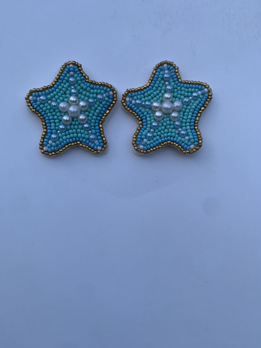 Small five-pointed star stud earrings in turquoise seed beads with pearl cluster centre.