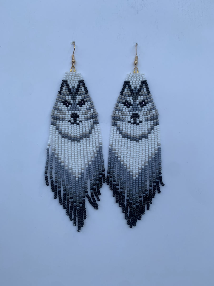 Long fringe earrings with beaded husky dog face panel in white and grey, ombre grey-to-black fringe below, wire hook.