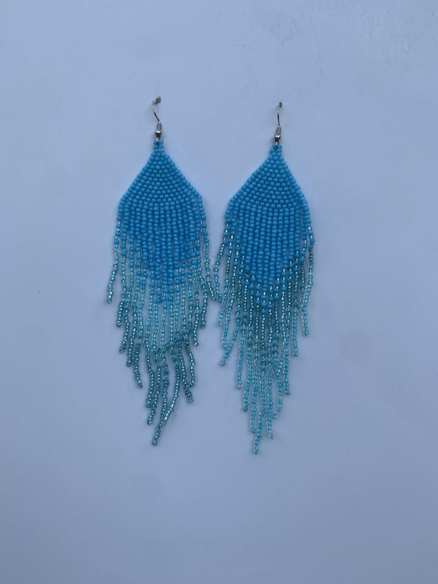 Long fringe earrings in solid turquoise seed beads with ombre transition to metallic silver bugle bead tips, wire hook.