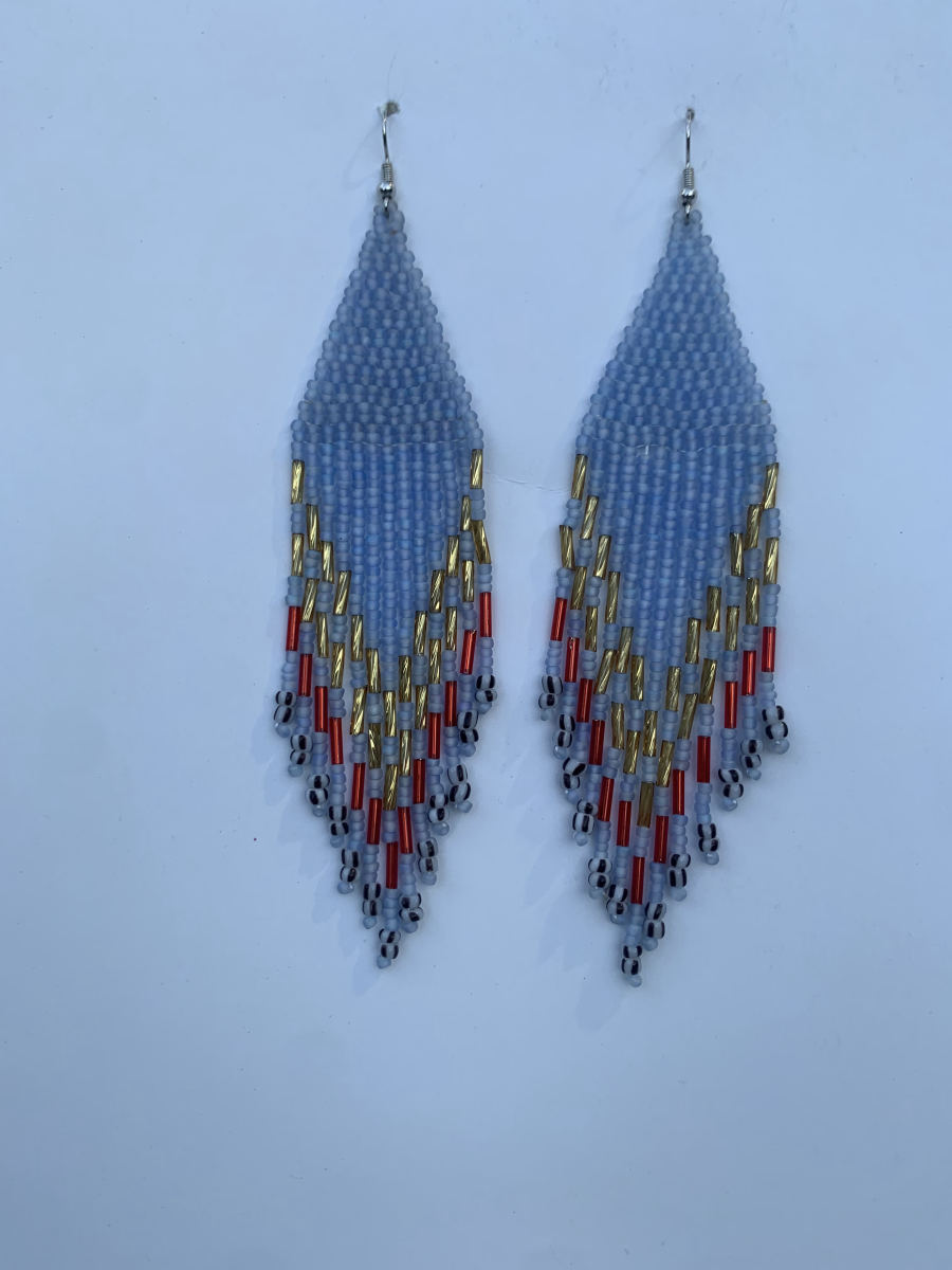 Long diamond-point fringe earrings in pale periwinkle with gold and red bugle bead chevron accent and black-and-white patterned tip beads, wire hook.