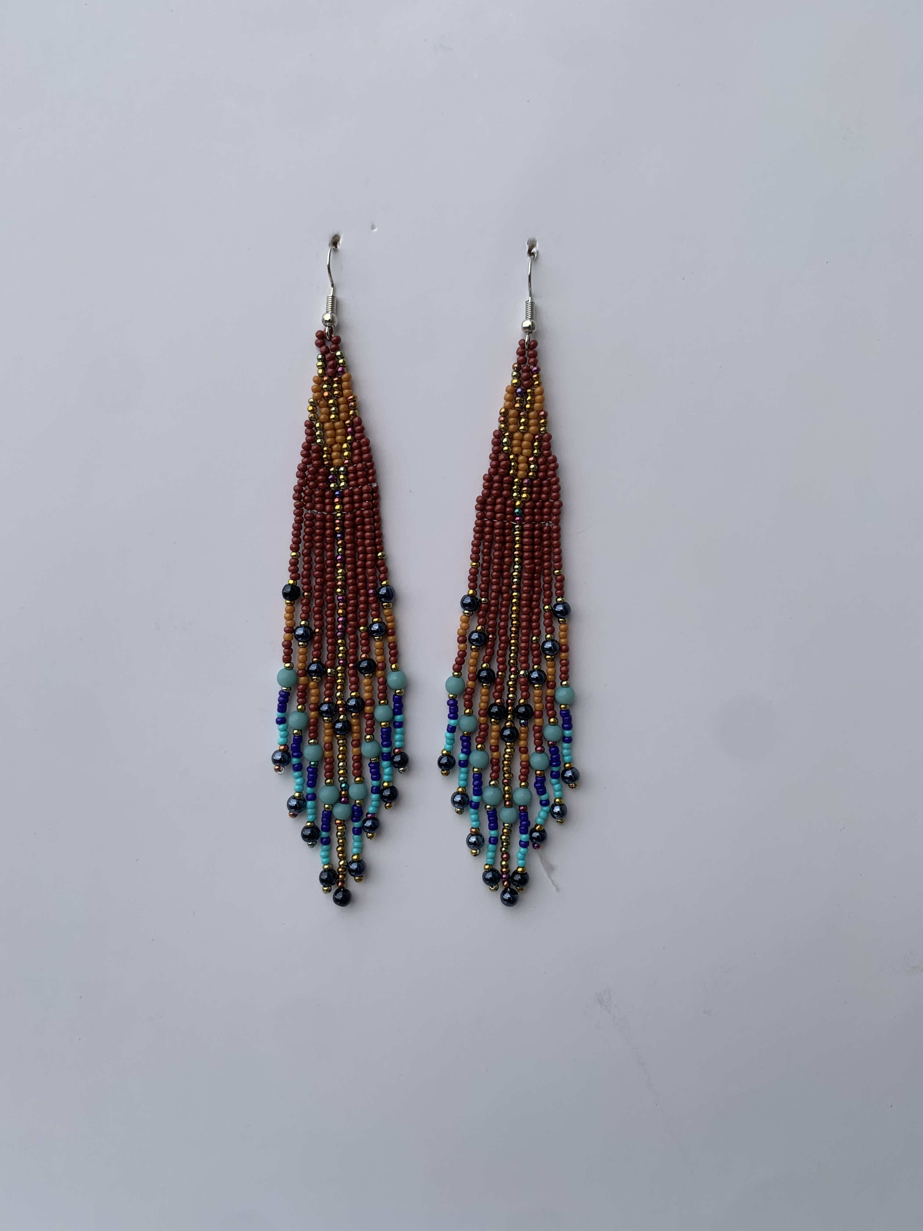 Nkroful Savanna Cascade — handmade brown, red, blue beaded fringe earrings by Rama, Ghana, Duncan BC