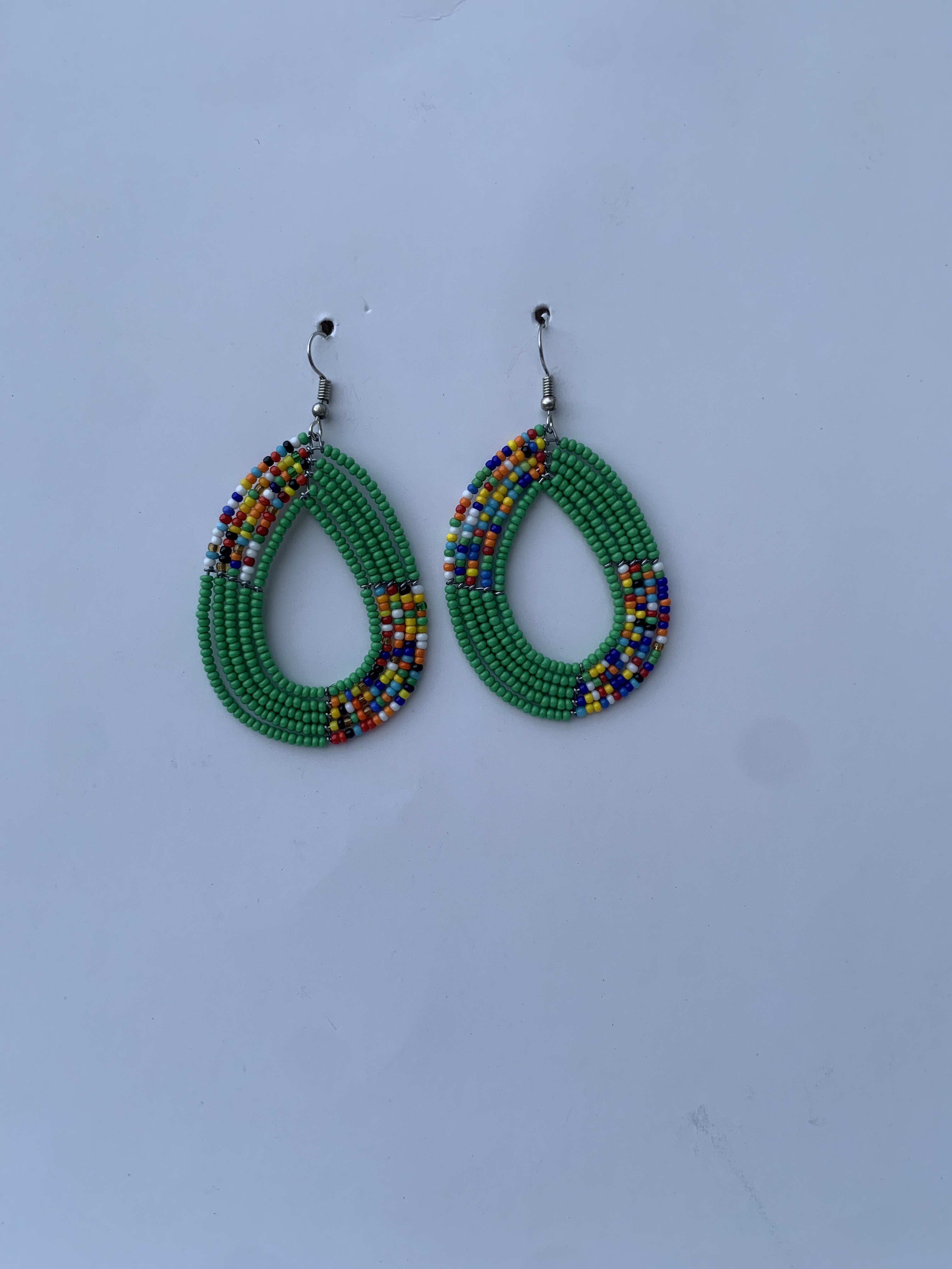 Osino Emerald Hoops — handmade green, multicolor beaded maasai hoop earrings by Rama, Ghana, Duncan BC