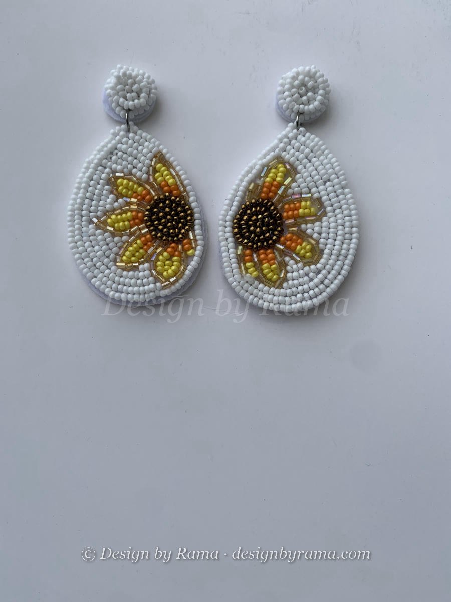 Anomabo Sunflower Drop &mdash; handmade beaded teardrop earrings by Rama with glass beads from Ghana