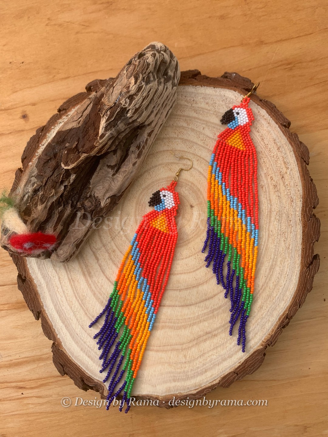 Kumawu Rainbow Macaw — handmade orange, red, rainbow, purple beaded novelty earrings by Rama, Ghana glass beads, Duncan BC