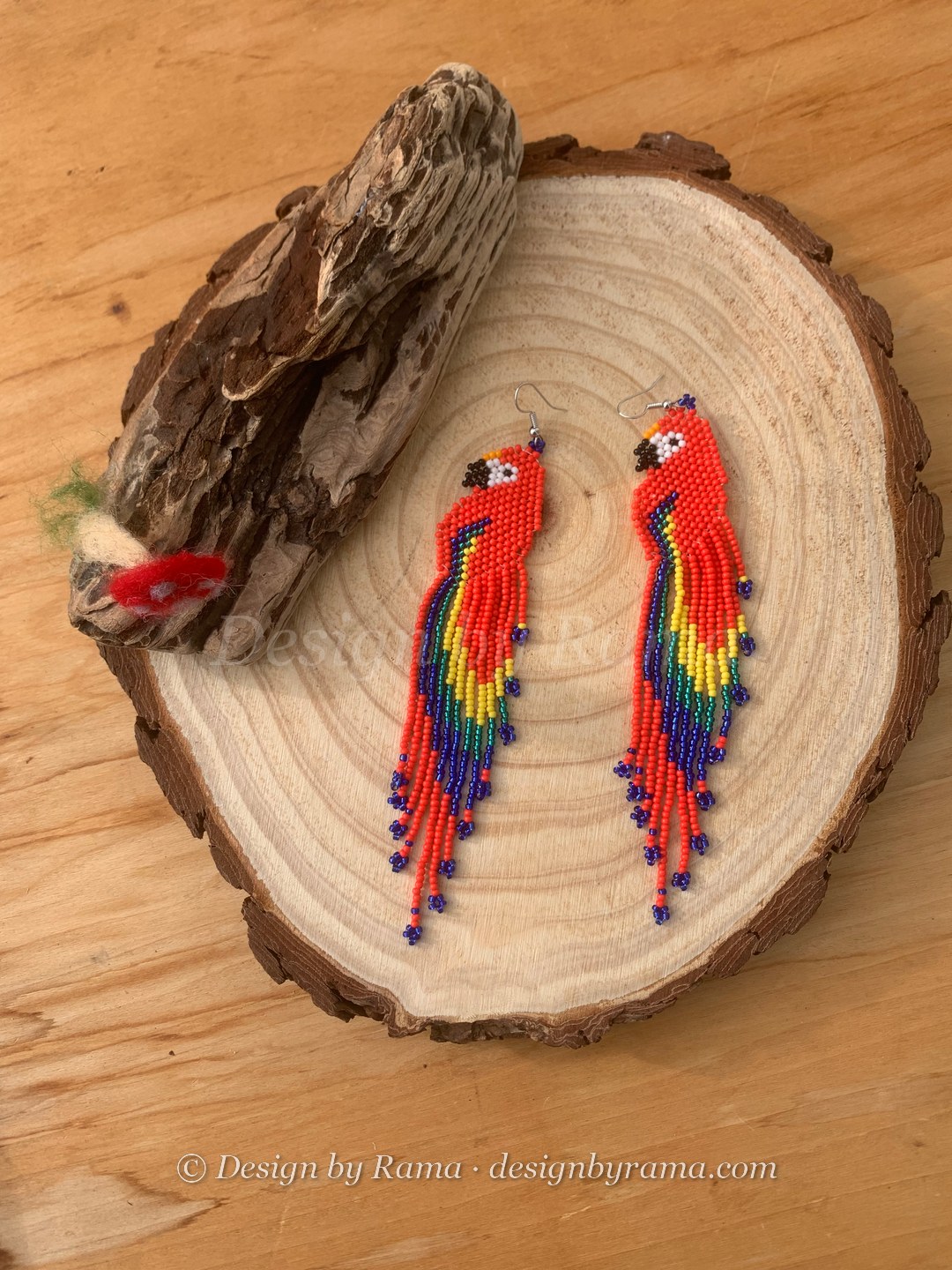 Nsuta Scarlet Macaw — handmade red, yellow, blue, rainbow beaded novelty earrings by Rama, Ghana glass beads, Duncan BC
