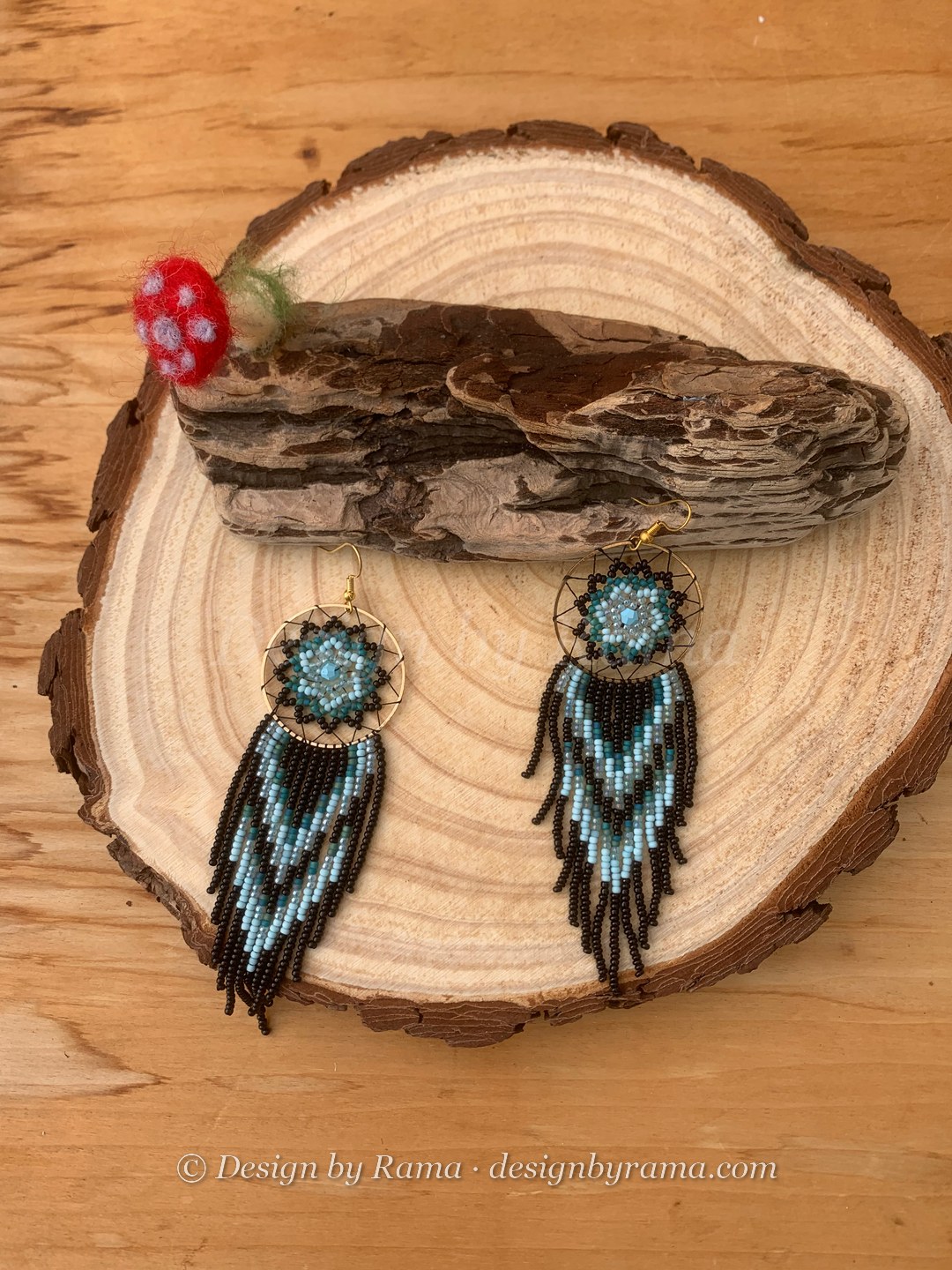 Tafo Ice Dreamcatcher — handmade black, ice blue, gold beaded fringe earrings by Rama, Ghana glass beads, Duncan BC